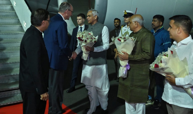 Federal Chancellor of the Federal Republic of Germany, H.E. Mr. Friedrich Merz received by Governor of Gujarat, Shri Acharya Devvrat upon his arrival at the airport in Ahmedabad