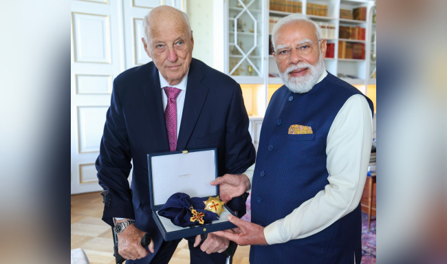 His Majesty King Harald V of Norway conferred upon Prime Minister Shri Narendra Modi the 'Grand Cross of the Royal Norwegian Order of Merit' in Oslo