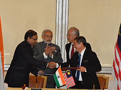 Prime Minister addressing at the 37th Singapore Lecture 'India's Singapore Story', in Hotel Shangri-La, Singapore on November 23, 2015.